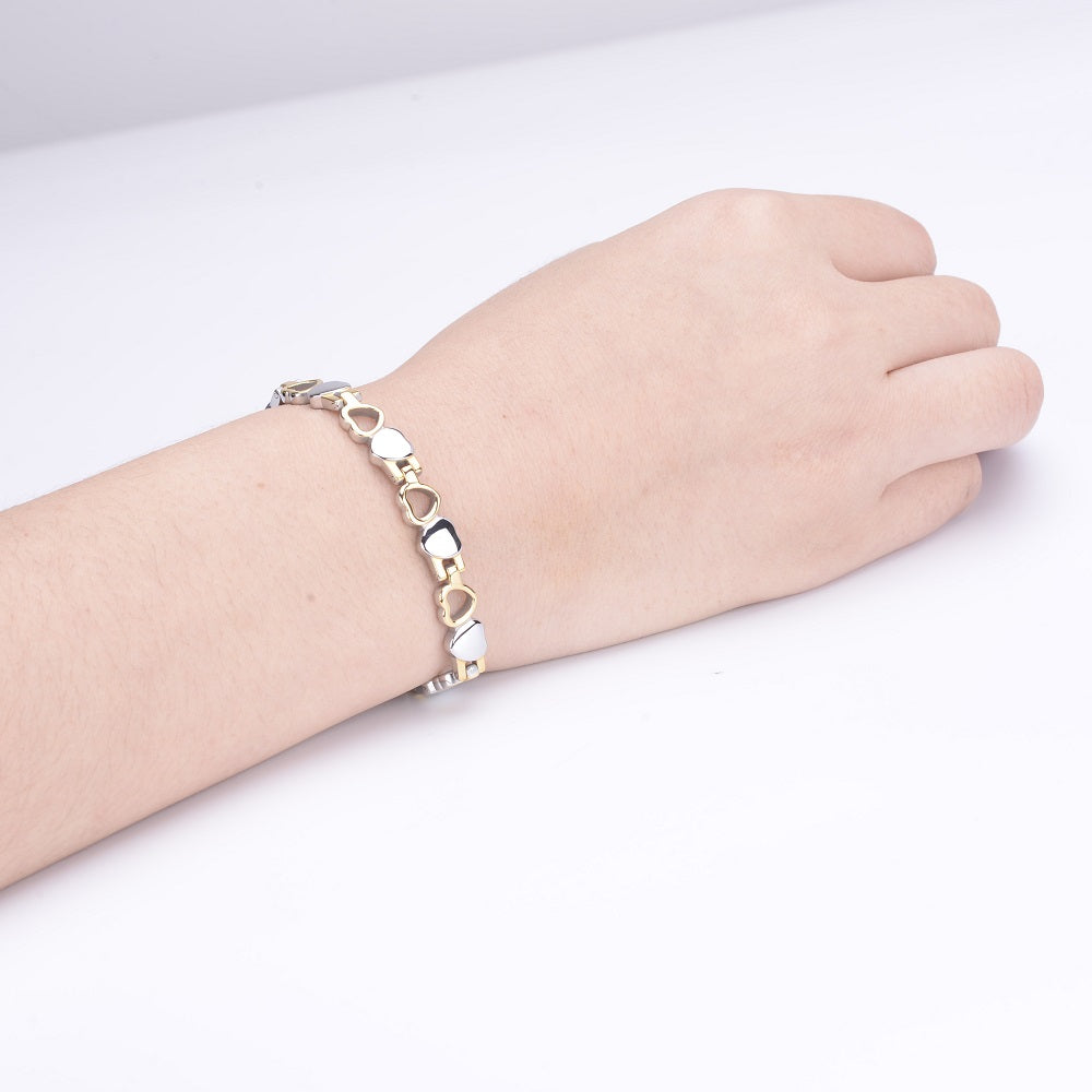 
                  
                    Stainless Steel Energy Bracelet 4-in-1, available in 9 colors, Model B041 with Hearts design
                  
                