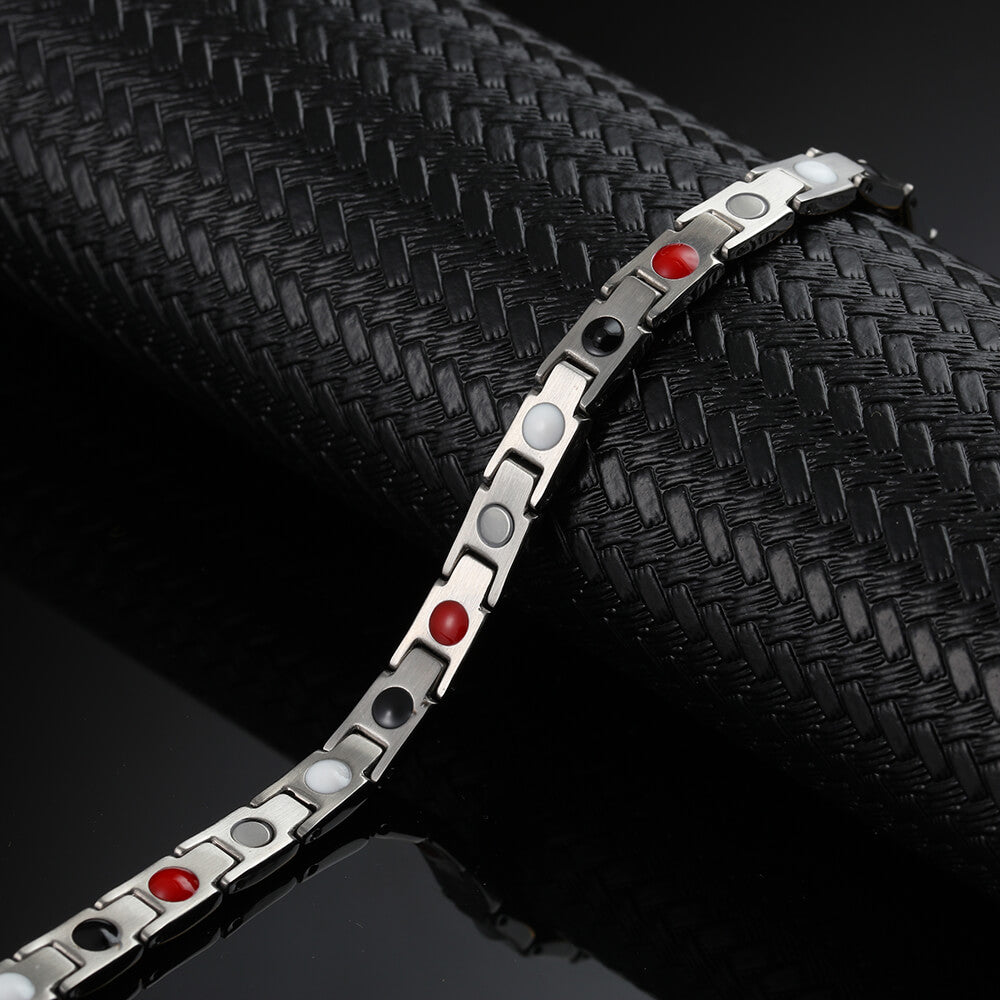 
                  
                    Stainless Steel Energy Bracelet 4-in-1. 2 Colors available. Model B001W
                  
                