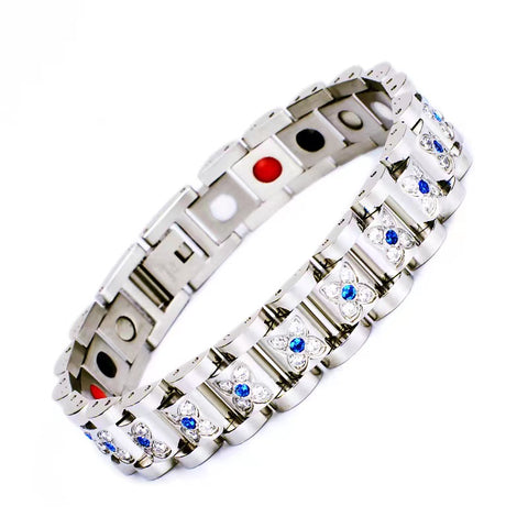 Silver stainless steel energy bracelet featuring blue floral crystal settings and magnetic therapy.