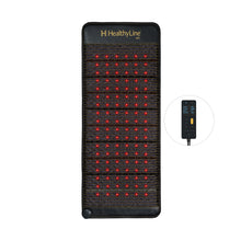 HealthyLine Jet 60x24 inch PEMF mat laid upright with glowing red photon lights across the dark textured surface, Gen 4 controller shown to the side
