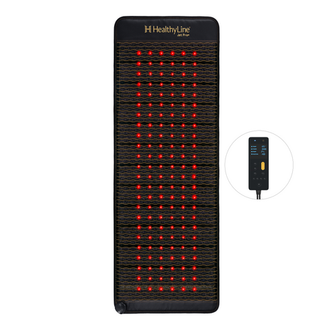 HealthyLine Jet Pro+ 74x28 inch PEMF mat, the widest size, laid upright with red photon lights glowing across the full dark surface, Gen 4 controller shown to the side