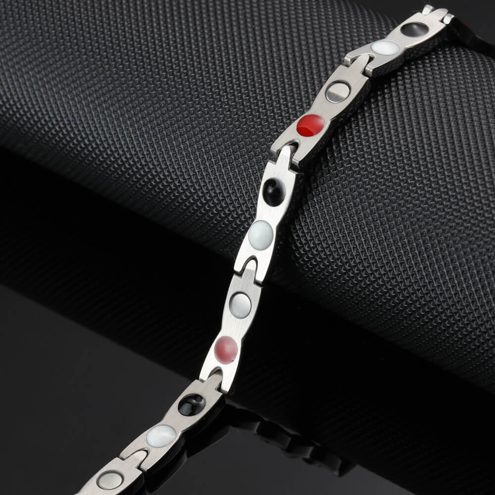 
                  
                    Stainless Steel Energy Bracelet 4-in-1 on Model's Wrist in Gold Color
                  
                