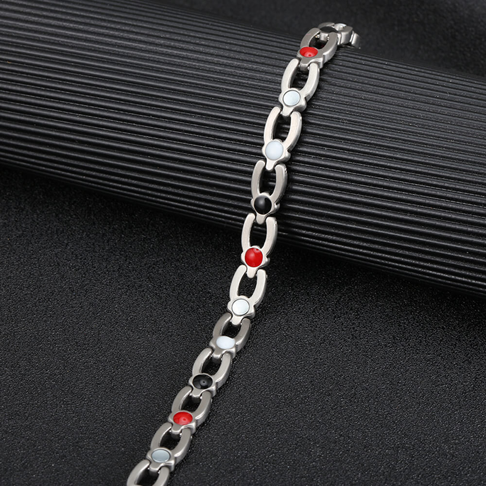 
                  
                    Stylish 4-in-1 stainless steel energy bracelet with crystals in 2 colors
                  
                