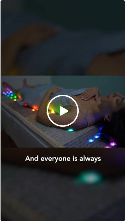 Natasha uses the Rainbow Chakra Mat to personalize client healing.