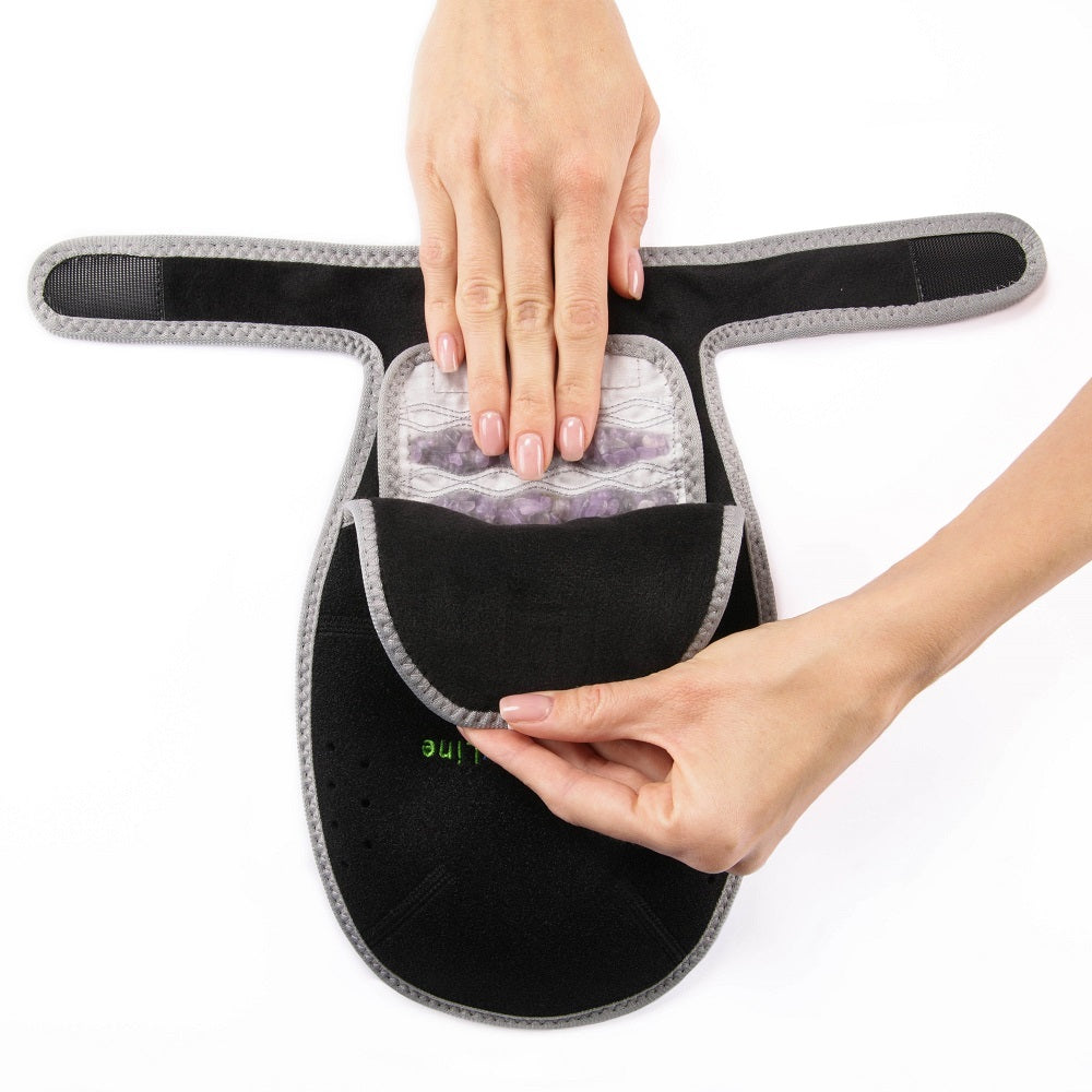 Portable Heated Gemstone Pad Hand Model by HealthyLine in use
