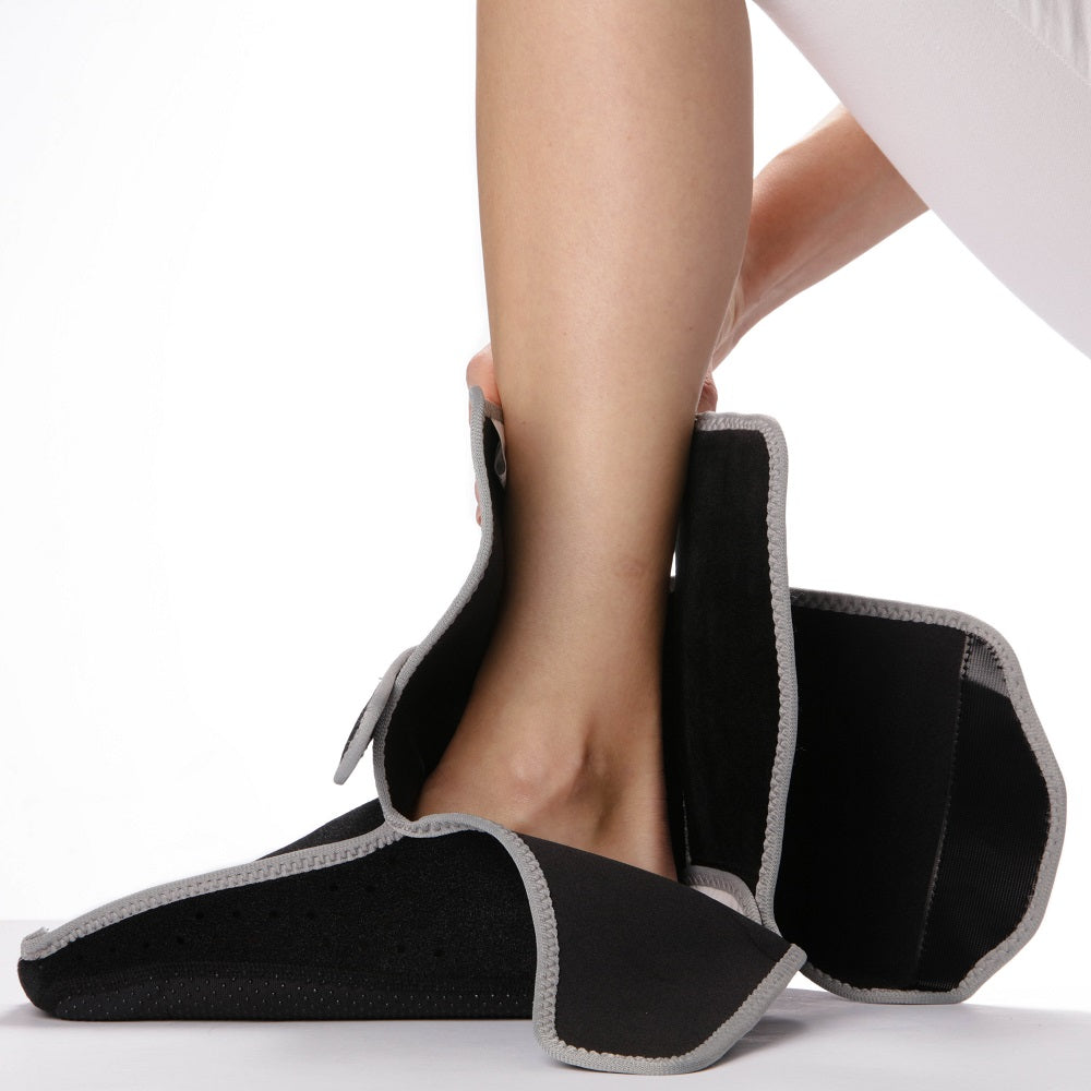 Portable Heated Gemstone Pad Foot Model  by HealthyLine in use
