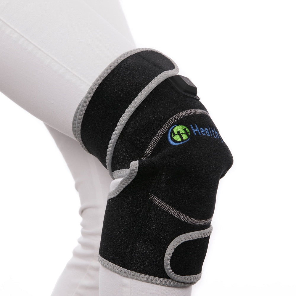 Portable Heated Gemstone Pad Knee Model  by HealthyLine in use on a white background 
