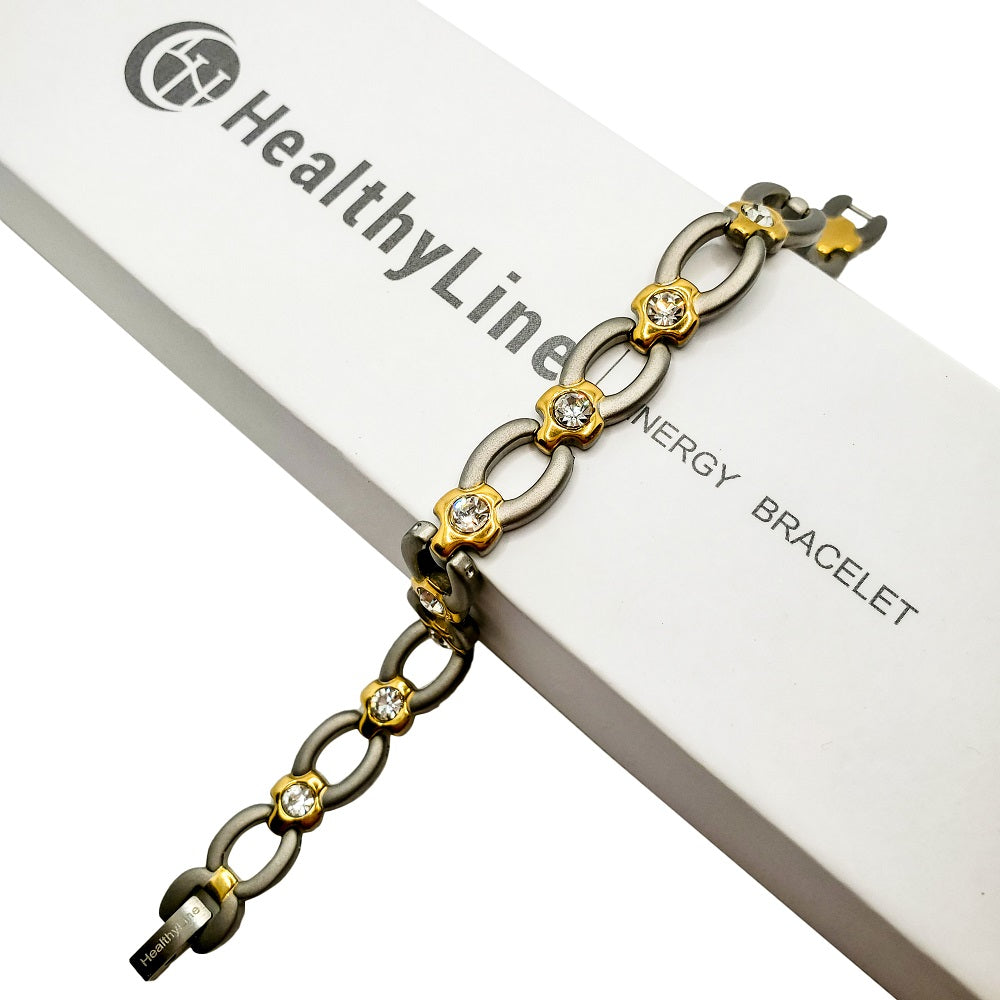 
                  
                    Titanium Lady’s Magnetic Power Bracelet. 3-in-1 Energy Negative Ions + Far Infrared Rays (FIR) + Germanium. Model BR-T-168. SilverGold color with Crystals (5)
                  
                