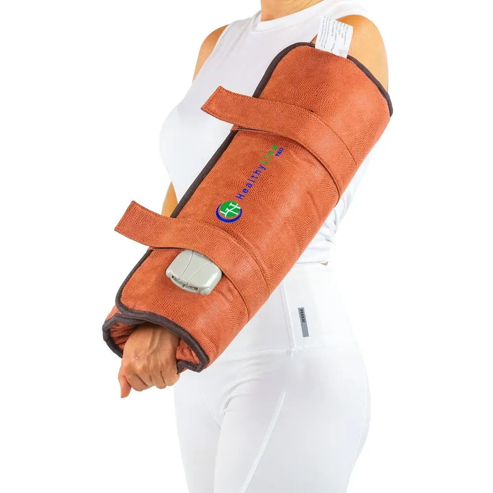 Person wearing the TAO Hand wrap secured around their upper arm
