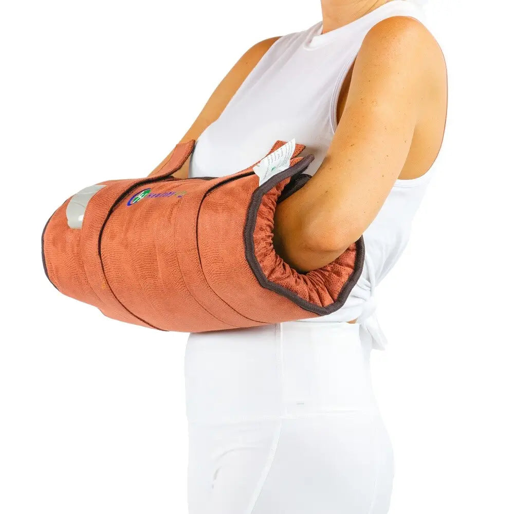 Person wearing the TAO Hand wrap secured around their elbow
