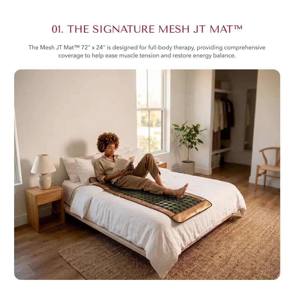 Person lying on the Mesh JT 72x24 mat on a bed reading a book, The Signature Mesh JT Mat bundle feature
