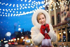 happy woman in the snow: how to relax and be happy during the holidays 