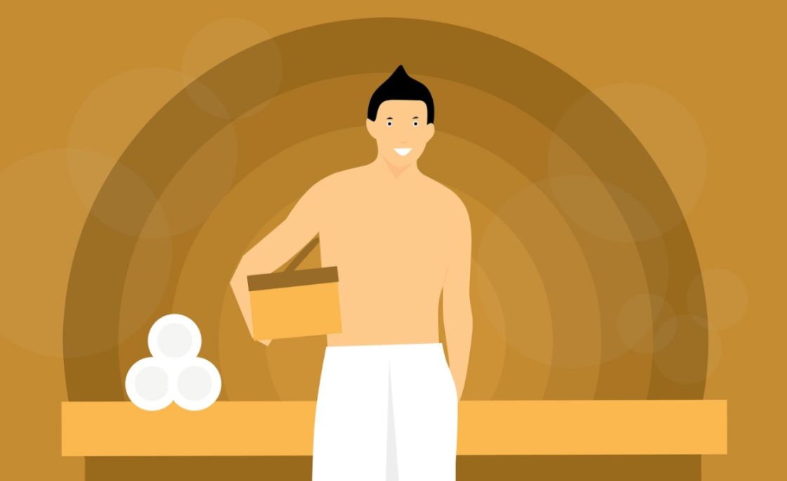 A person using a sauna and receiving the benefits of sweating.